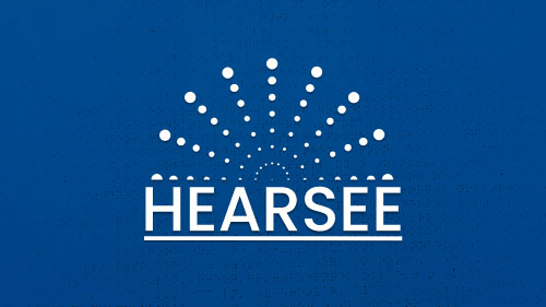Hearsee logo featuring a pattern of white dots radiating outward on a blue background with braille texture, with the word 'Hearsee' in bold white letters below.